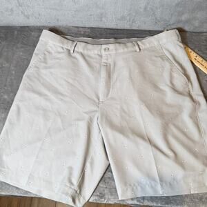 Greg Norman Golf Shorts Mens 40 Beige Stretch Performance Shark Logo